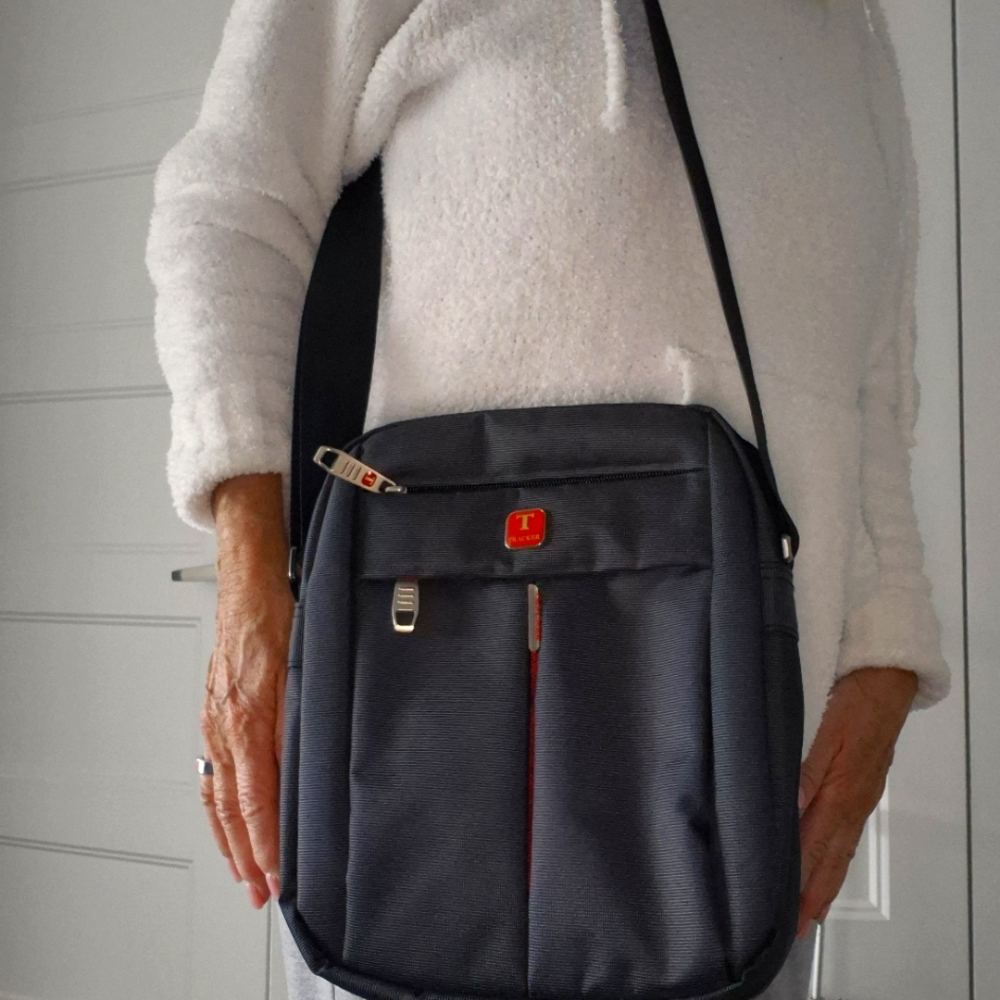 Tracker Black Messenger Bag with Durable Fabric and Flap Closure